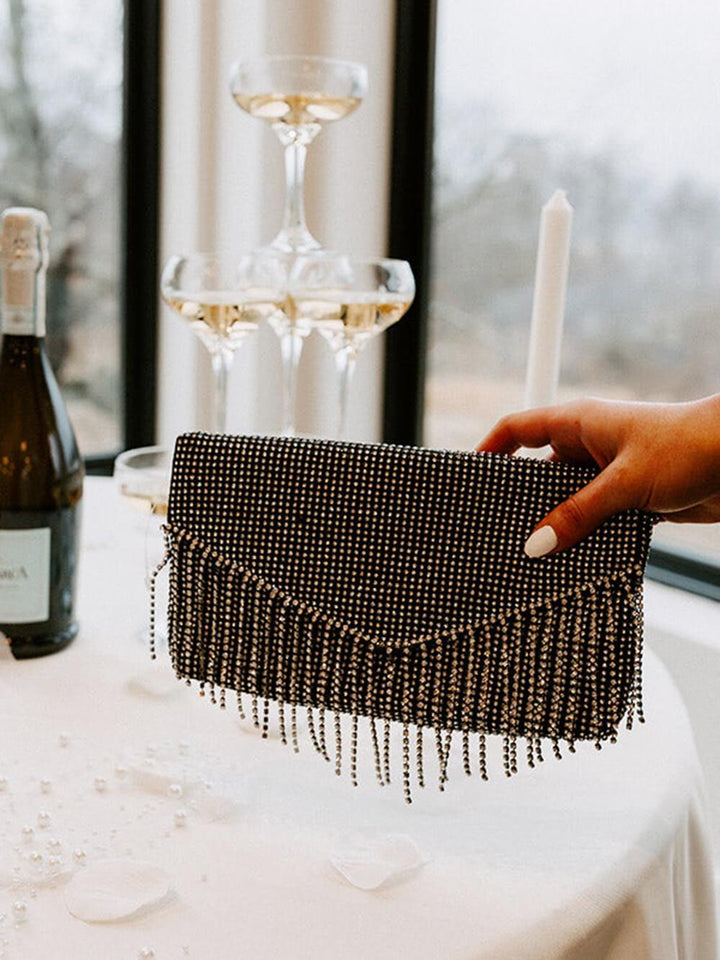 Susie | Women’s crystal beaded clutch bag with fringe detail