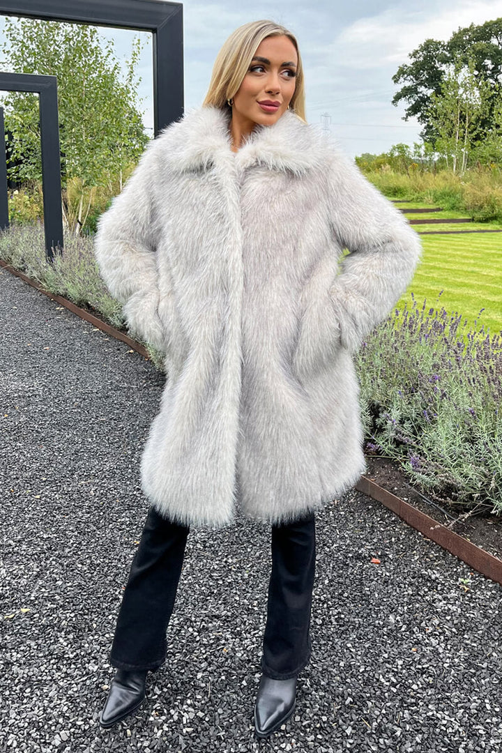 Arlita | Women’s long faux fur coat with collar and snap closure
