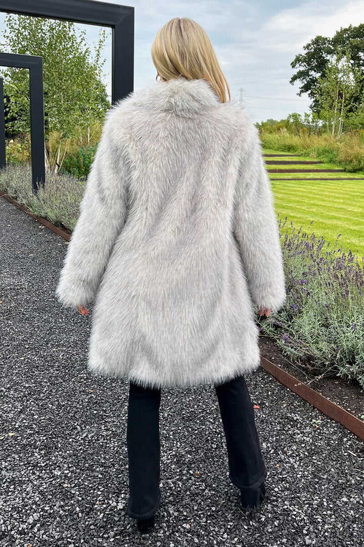 Arlita | Women’s long faux fur coat with collar and snap closure