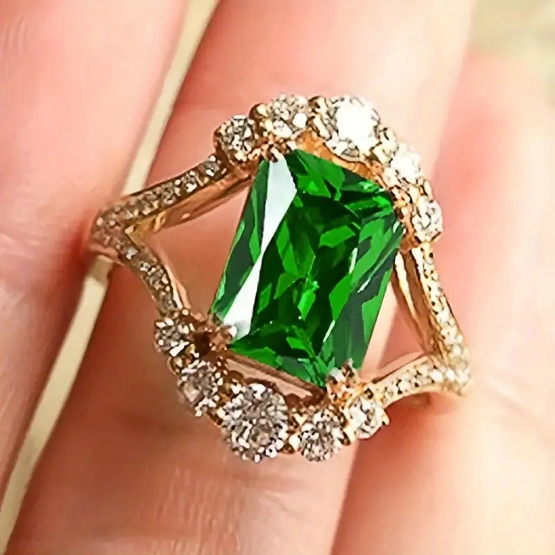 Diezel | Women’s cocktail ring with emerald green stone and crystal halo