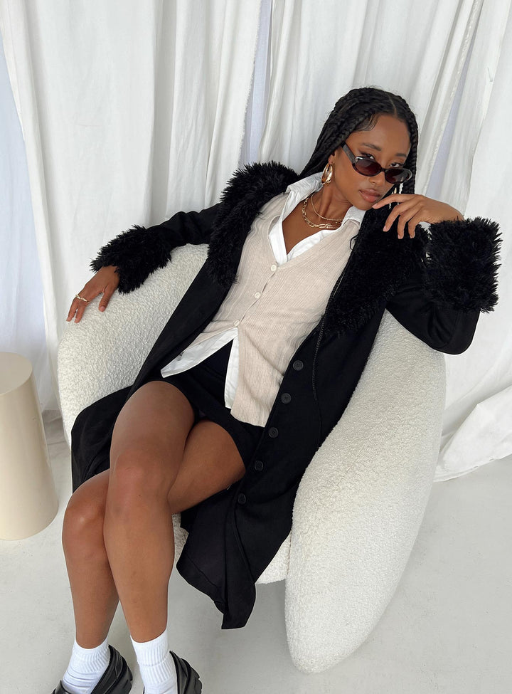 Einna | Women’s long faux suede coat with lapel collar and button front