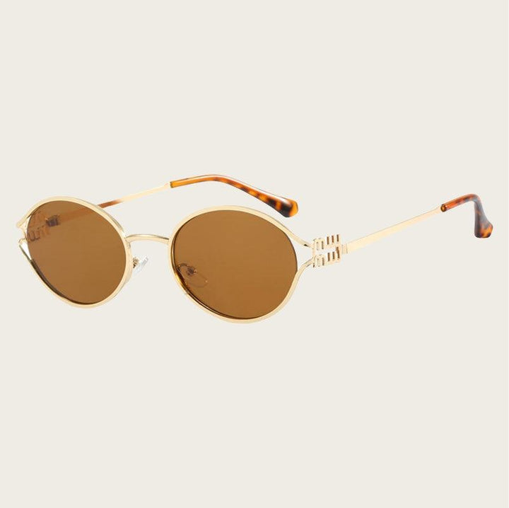 Sumer | Women's oval frame sunglasses with gold frame and brown/black lenses