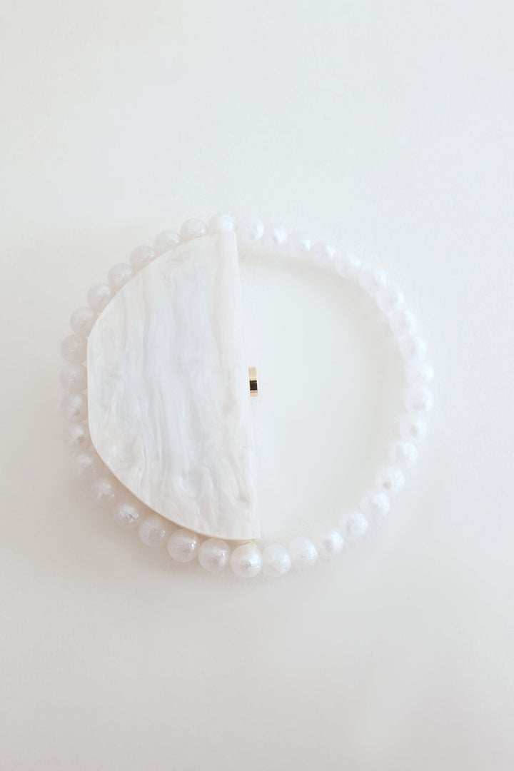 Shanna | Women’s acrylic clutch bag with pearl-like finish and beaded handle