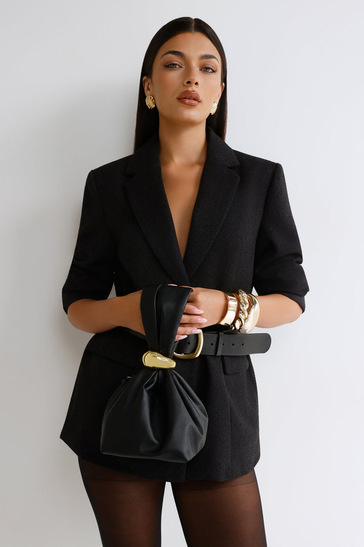 Anabell | Women’s pouch handle bag with gold hardware detail