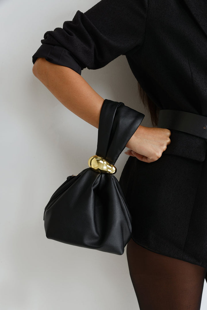 Anabell | Women’s pouch handle bag with gold hardware detail