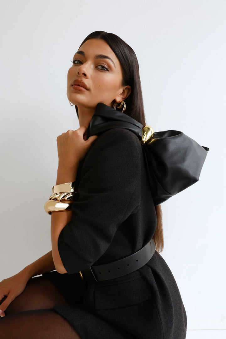 Anabell | Women’s pouch handle bag with gold hardware detail