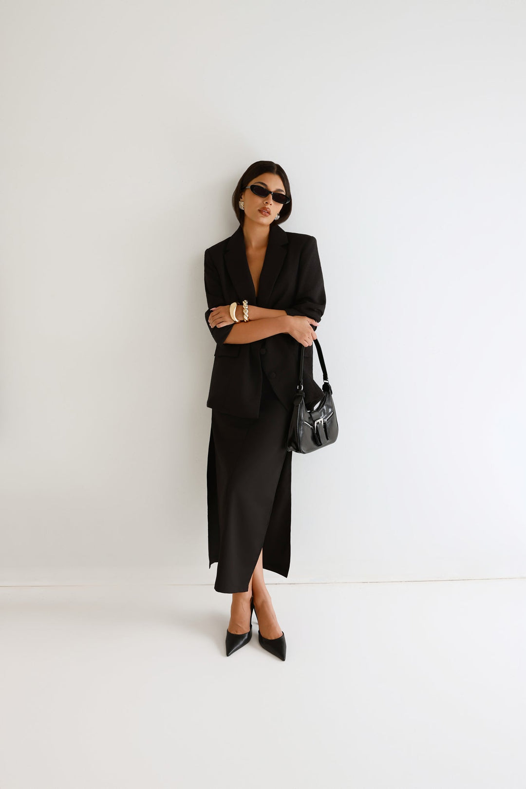 Anamarie | Women’s crescent shoulder bag with buckle detail and zip closure