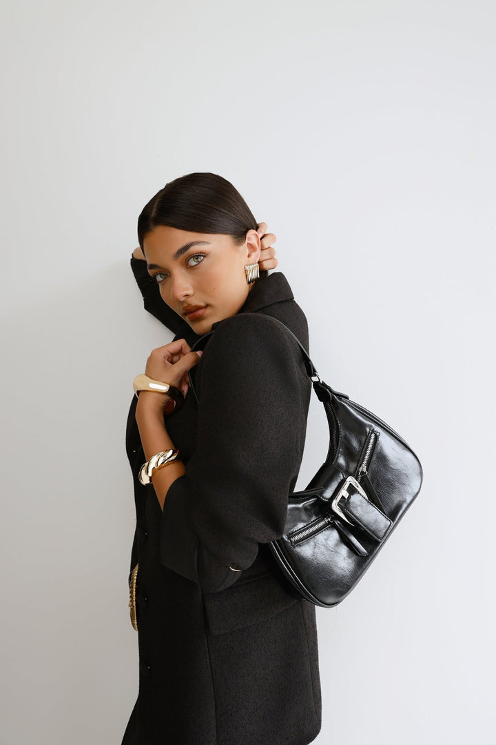 Anamarie | Women’s crescent shoulder bag with buckle detail and zip closure