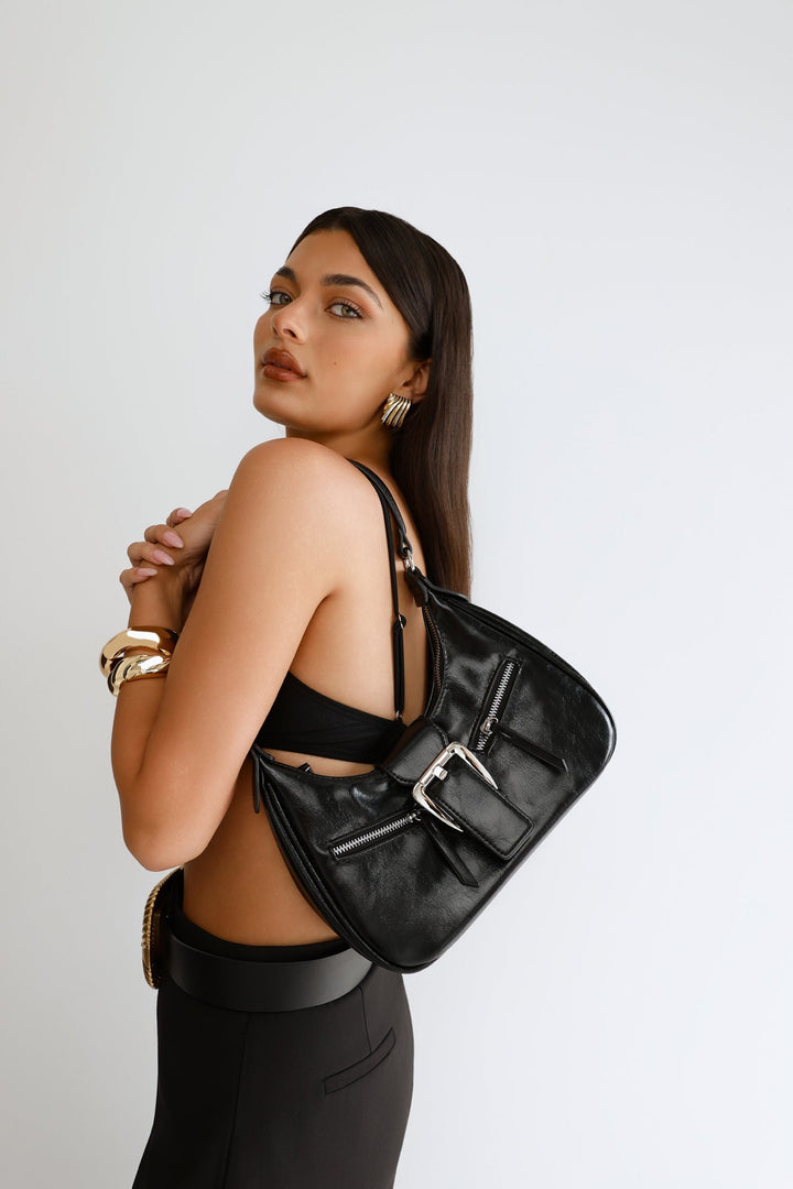 Anamarie | Women’s crescent shoulder bag with buckle detail and zip closure