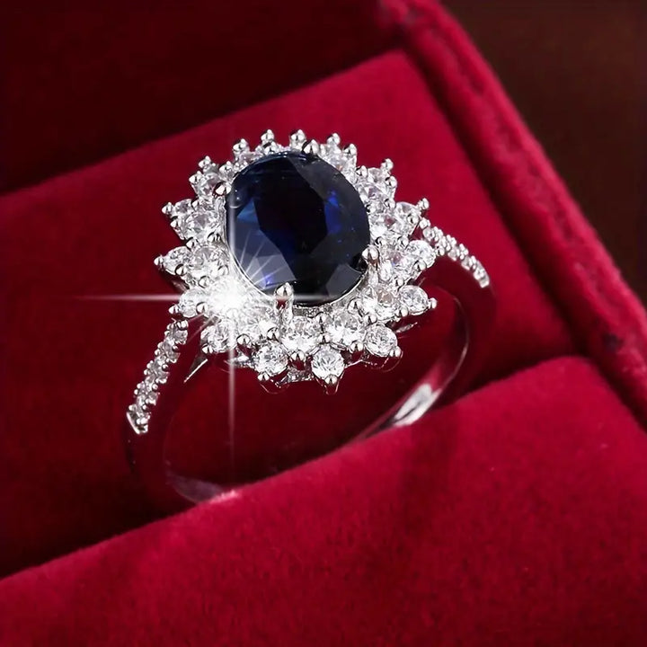 Bonnie | Women’s statement ring with sapphire blue stone and crystal halo design