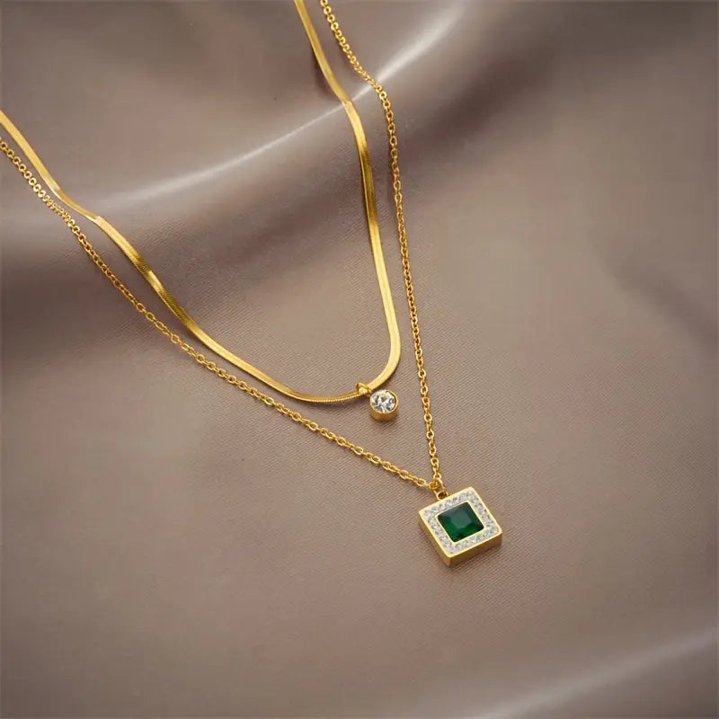 Emma | Women’s layered necklace with emerald pendant and crystal accent