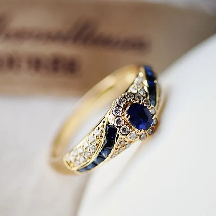 Eva | Women’s sapphire-inspired ring with gold band and crystal accents