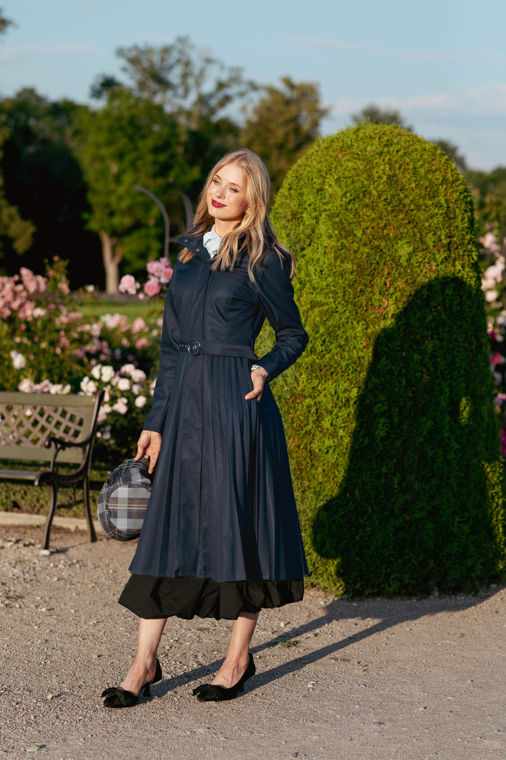 Arnita | Women’s elegant pleated trench coat with belted waist and removable hood