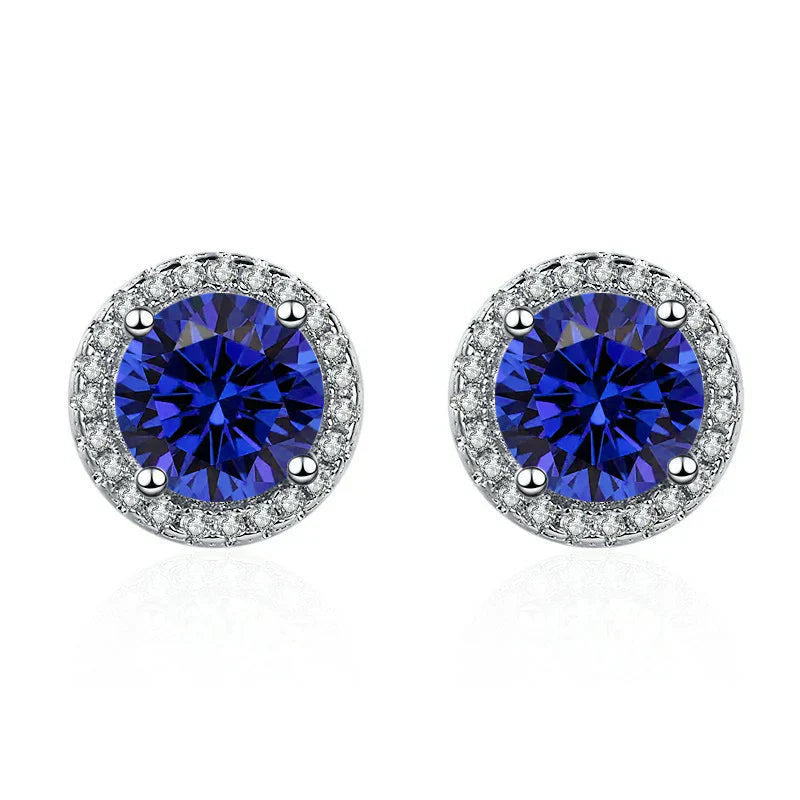 Luca | Women’s stud earrings with round blue stone and halo design