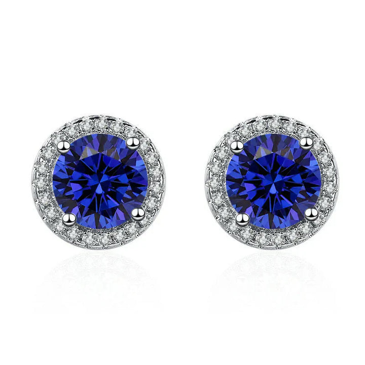 Luca | Women’s stud earrings with round blue stone and halo design