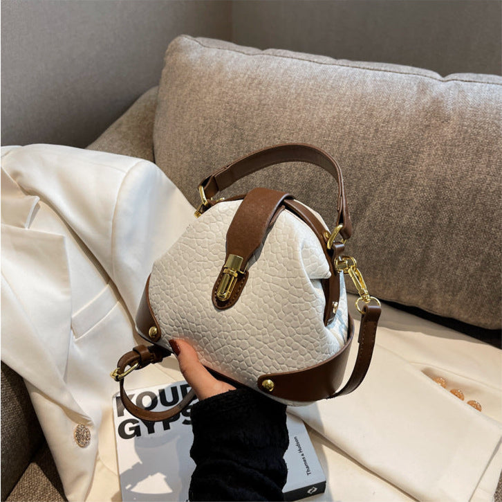 Patty | Women’s compact crossbody bag with contrast detail and top handle