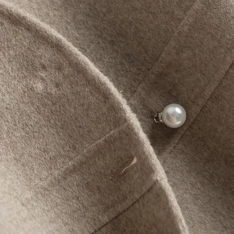 Ellie | Women’s sleeveless drape vest with pearl detail