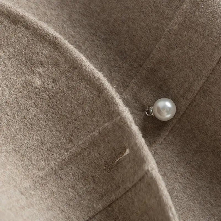 Ellie | Women’s sleeveless drape vest with pearl detail