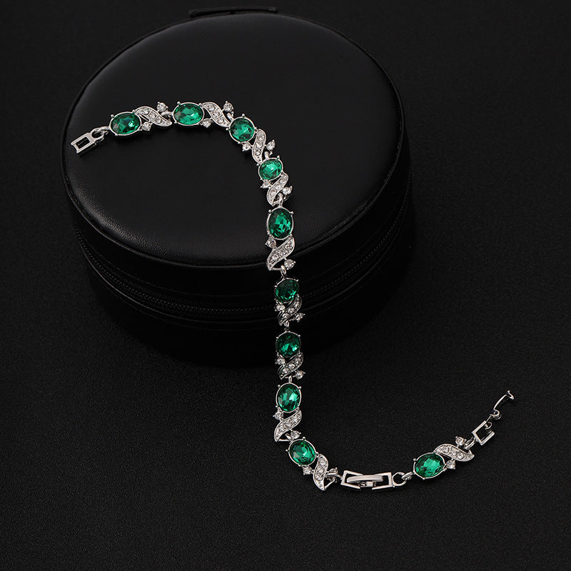Glenda | Women’s bracelet with emerald stones and white-gold finish