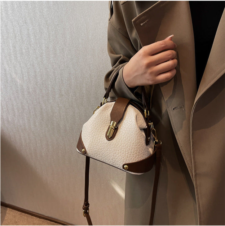 Patty | Women’s compact crossbody bag with contrast detail and top handle