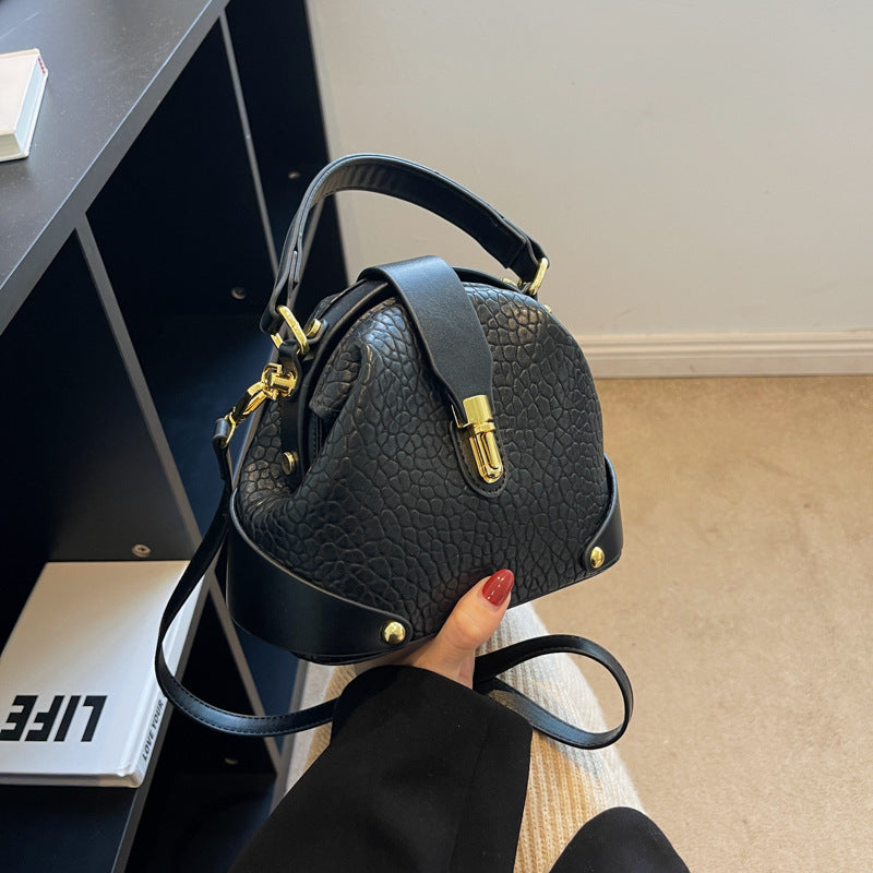 Patty | Women’s compact crossbody bag with contrast detail and top handle