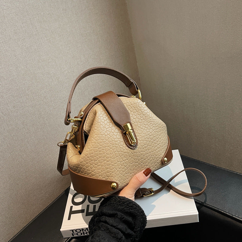 Patty | Women’s compact crossbody bag with contrast detail and top handle