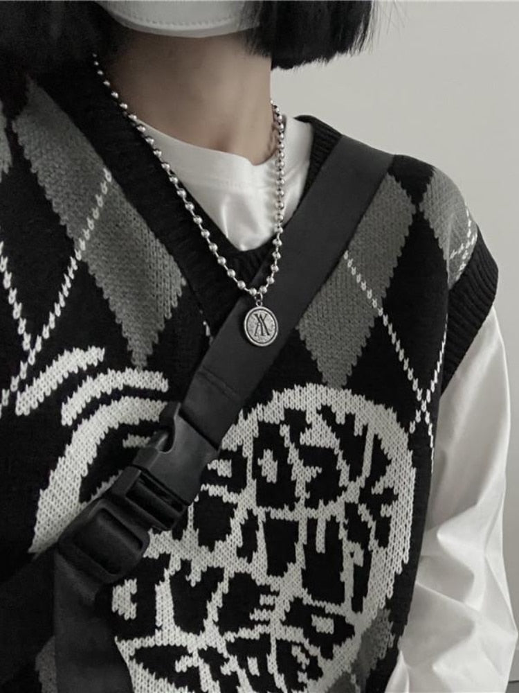 Mitch | Women’s argyle sweater vest with graphic heart design