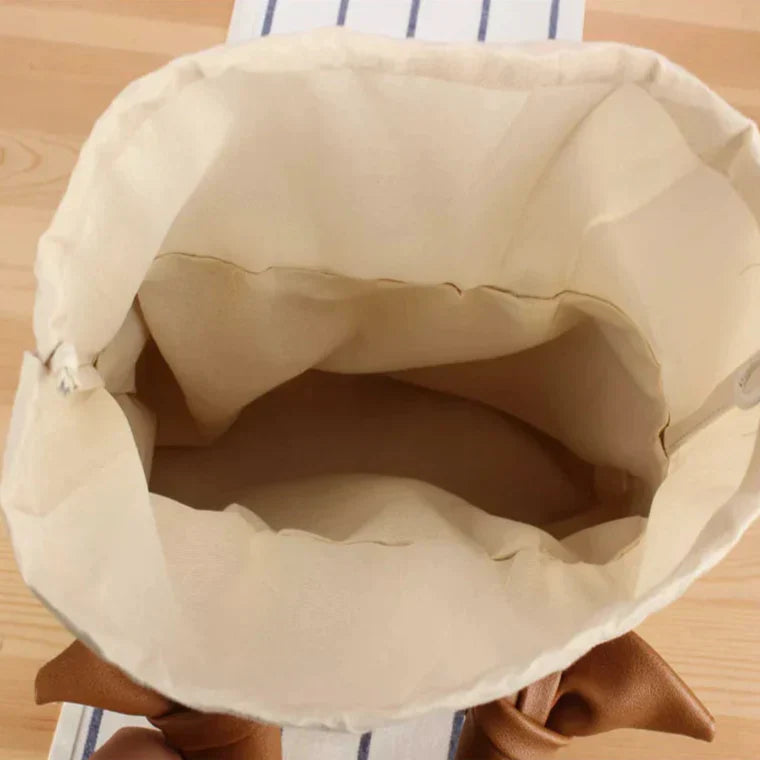 Morgan | Women’s straw handbag with drawstring interior and knotted handle