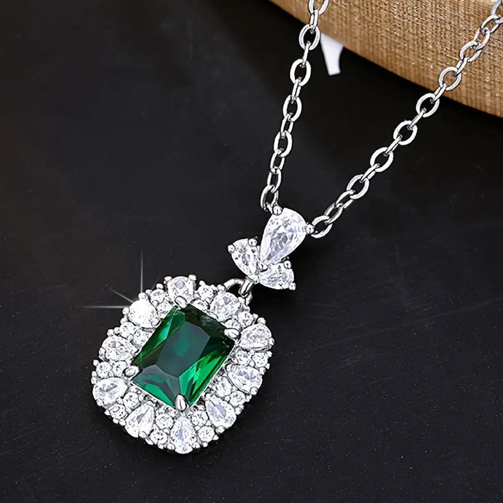 Mikha | Women’s emerald cut pendant necklace with crystal halo
