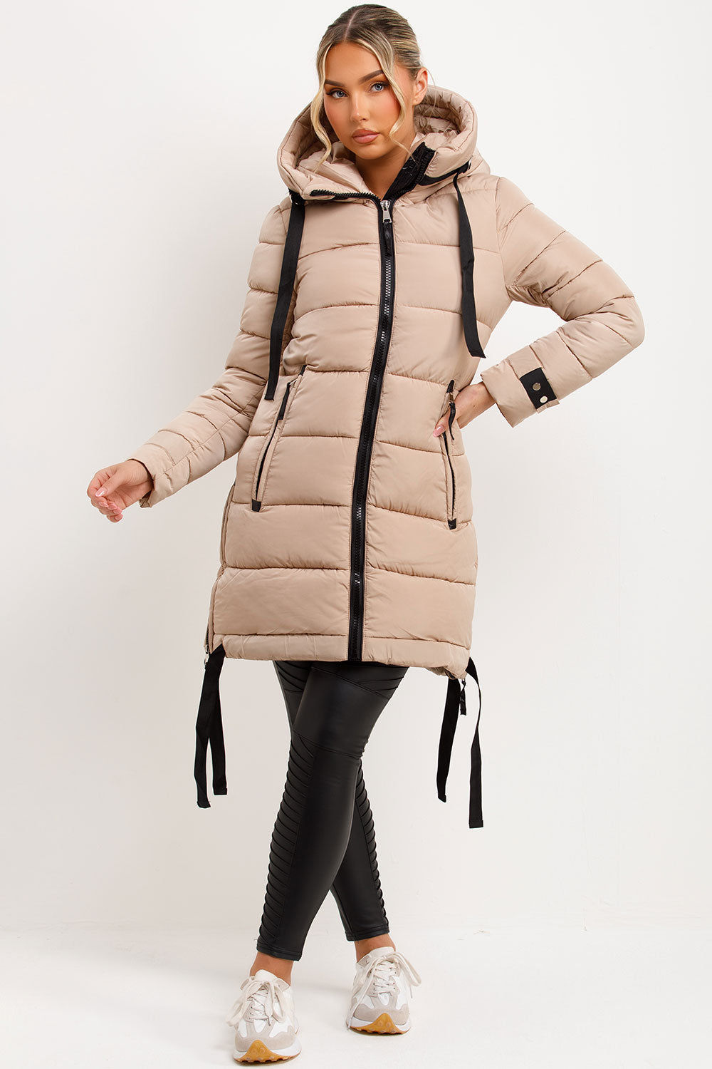 Mylenna | Women’s long puffer coat with hood and side straps