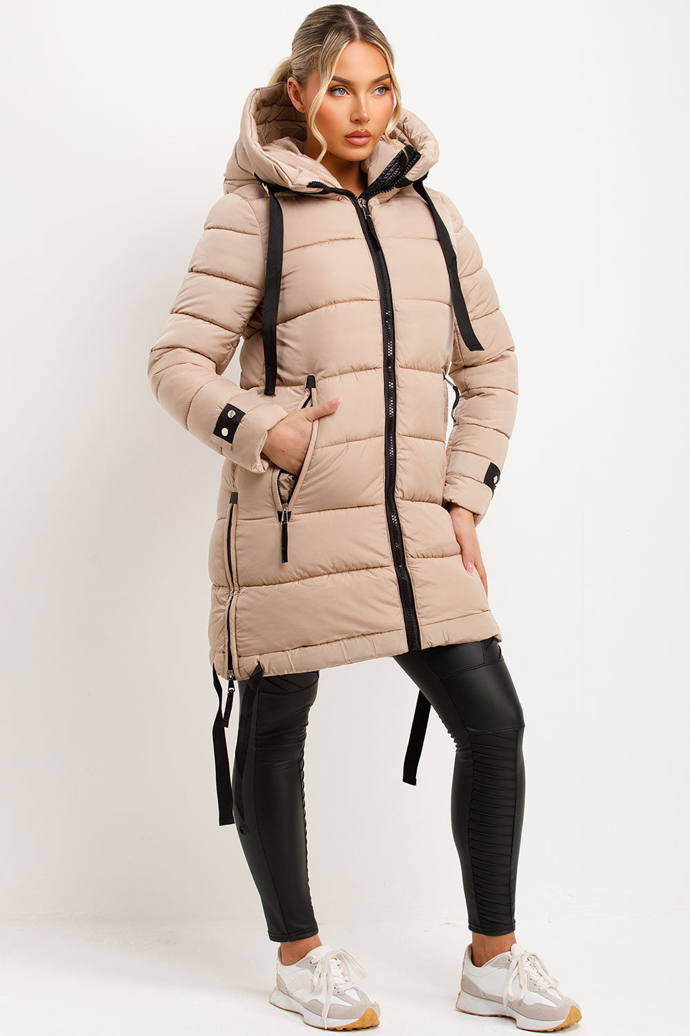Mylenna | Women’s long puffer coat with hood and side straps