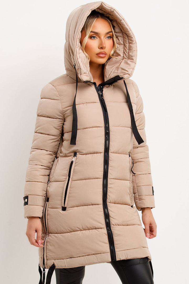 Mylenna | Women’s long puffer coat with hood and side straps