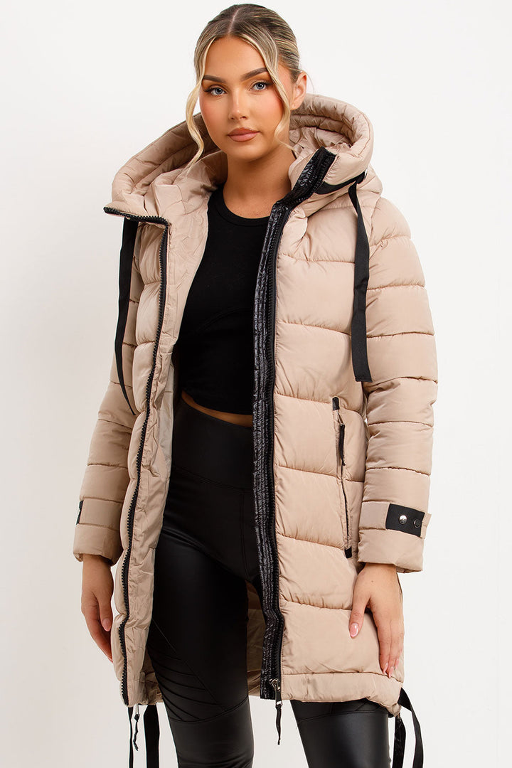 Mylenna | Women’s long puffer coat with hood and side straps