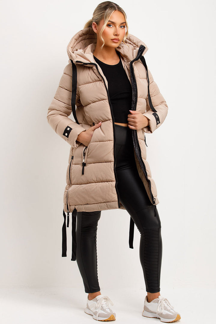 Mylenna | Women’s long puffer coat with hood and side straps