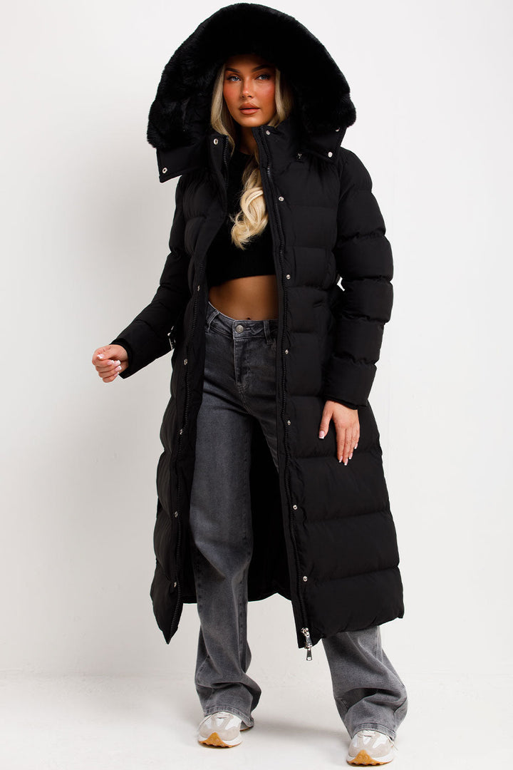 Corinne | Long puffer coat with faux fur hood and belt