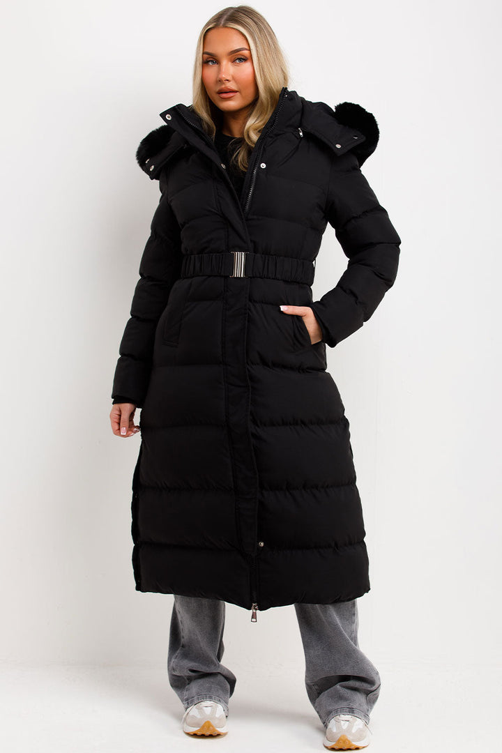 Corinne | Long puffer coat with faux fur hood and belt