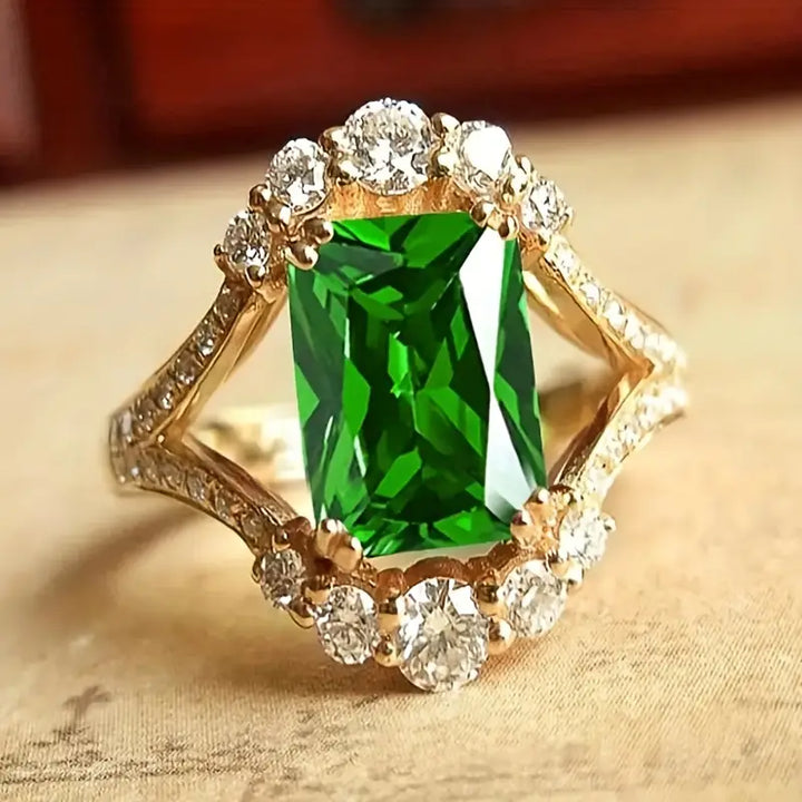 Diezel | Women’s cocktail ring with emerald green stone and crystal halo