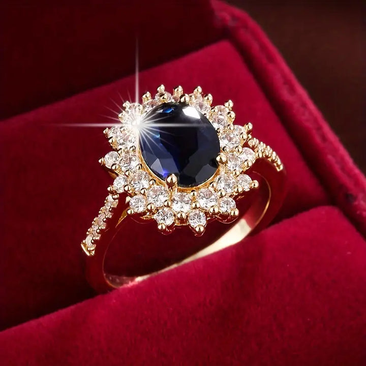 Bonnie | Women’s statement ring with sapphire blue stone and crystal halo design