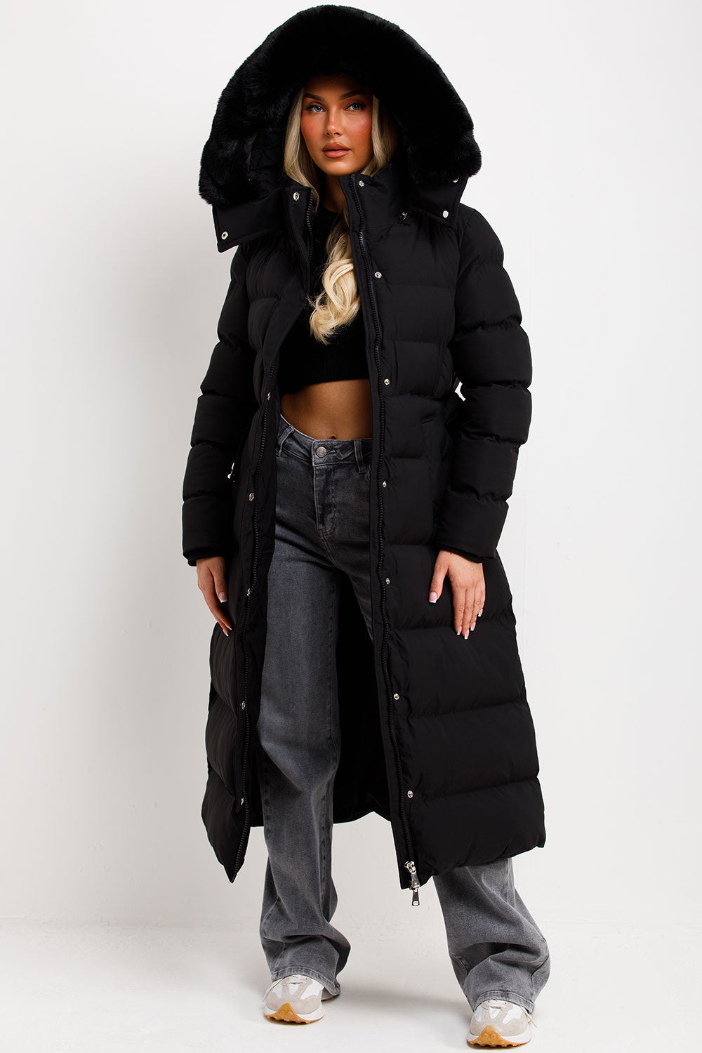 Corinne | Long puffer coat with faux fur hood and belt