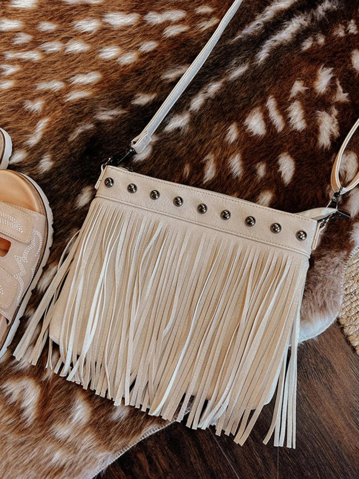 Shane | Women’s fringe crossbody bag with studded detailing