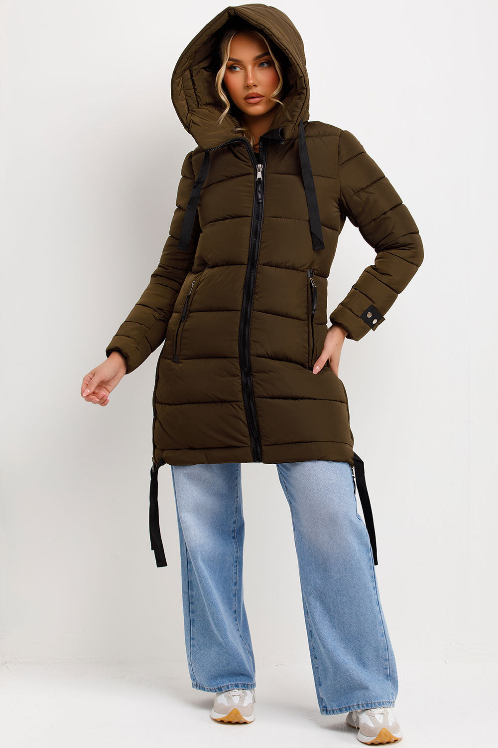 Kaeli | Women’s long puffer coat with hood and side straps