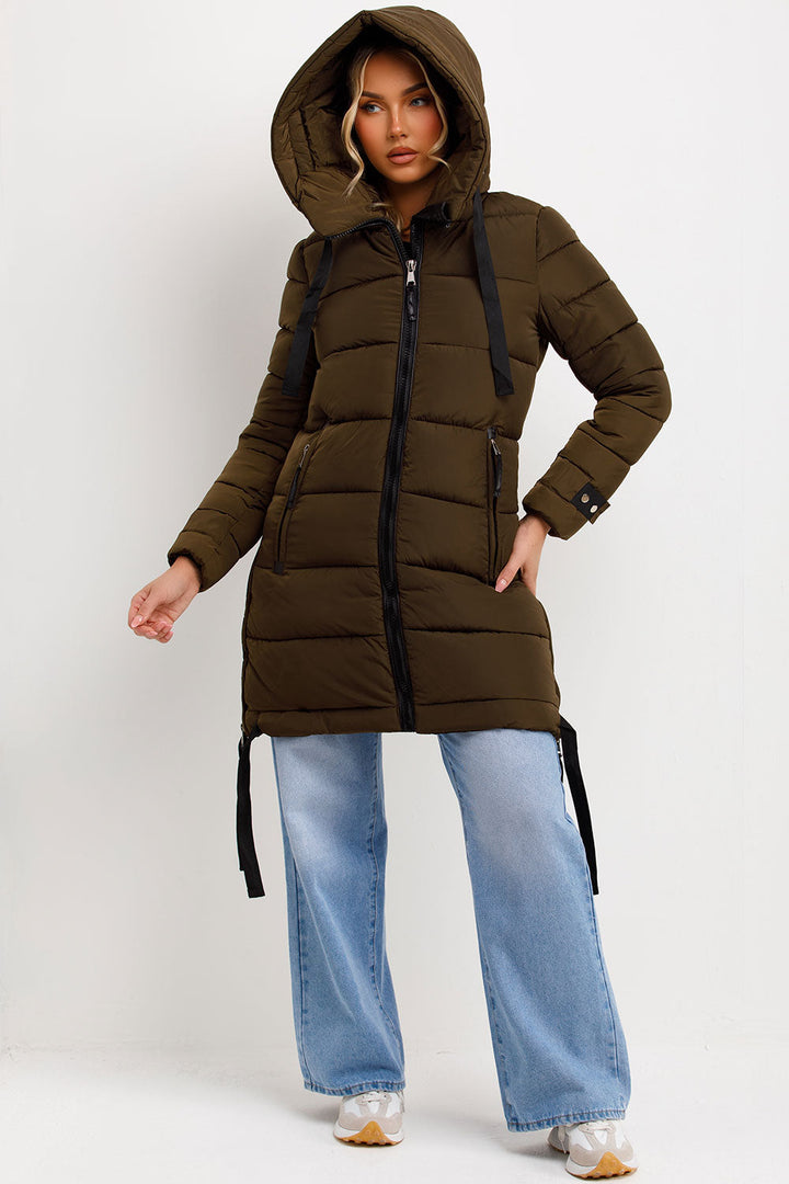 Kaeli | Women’s long puffer coat with hood and side straps