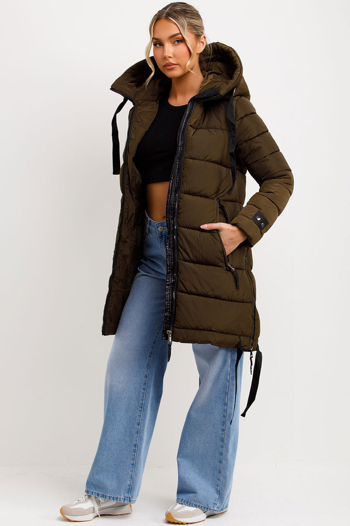 Kaeli | Women’s long puffer coat with hood and side straps