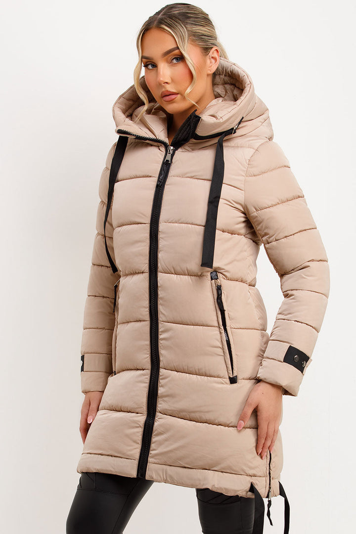 Mylenna | Women’s long puffer coat with hood and side straps