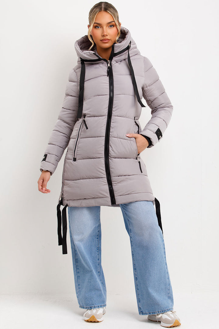 Ambriah | Women’s long puffer coat with hood and side straps