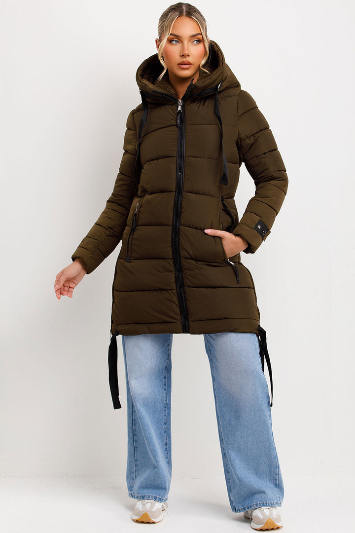 Kaeli | Women’s long puffer coat with hood and side straps