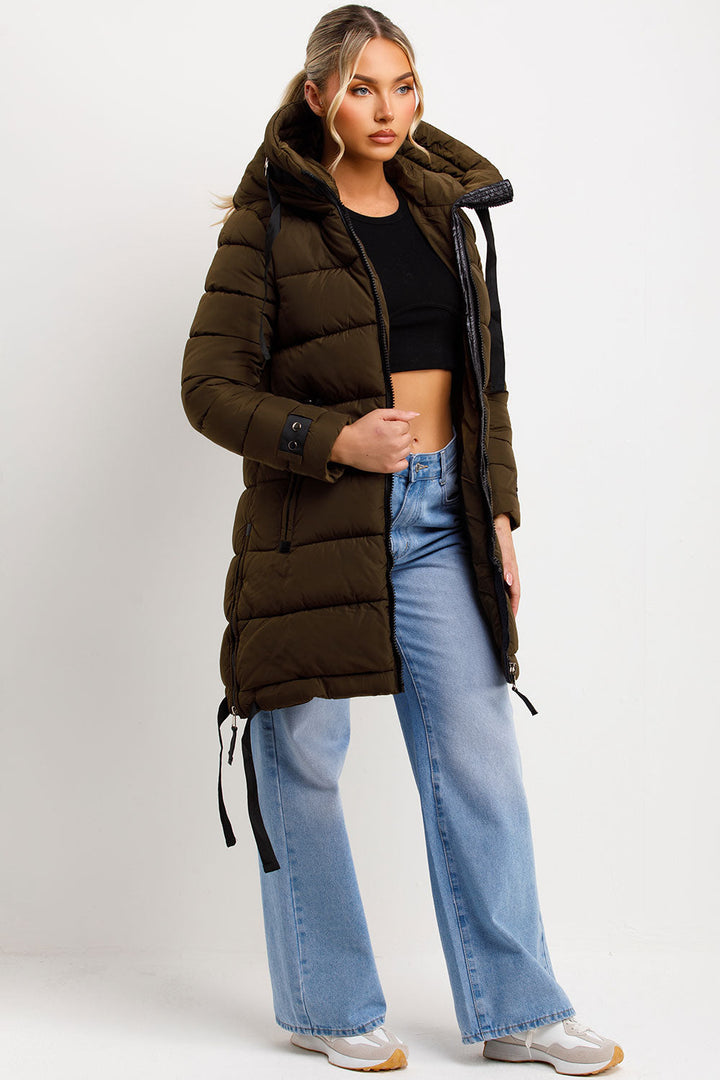 Kaeli | Women’s long puffer coat with hood and side straps