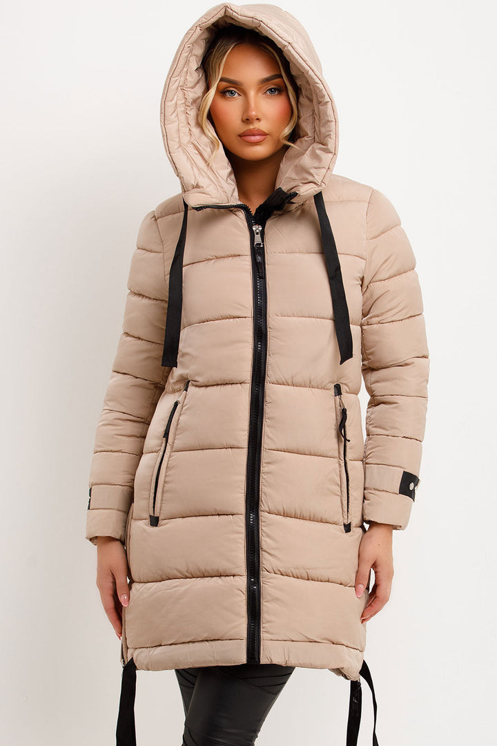 Mylenna | Women’s long puffer coat with hood and side straps