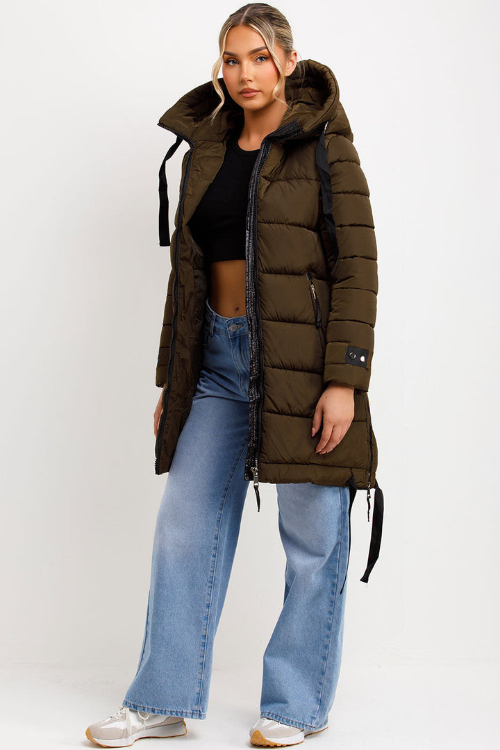 Kaeli | Women’s long puffer coat with hood and side straps