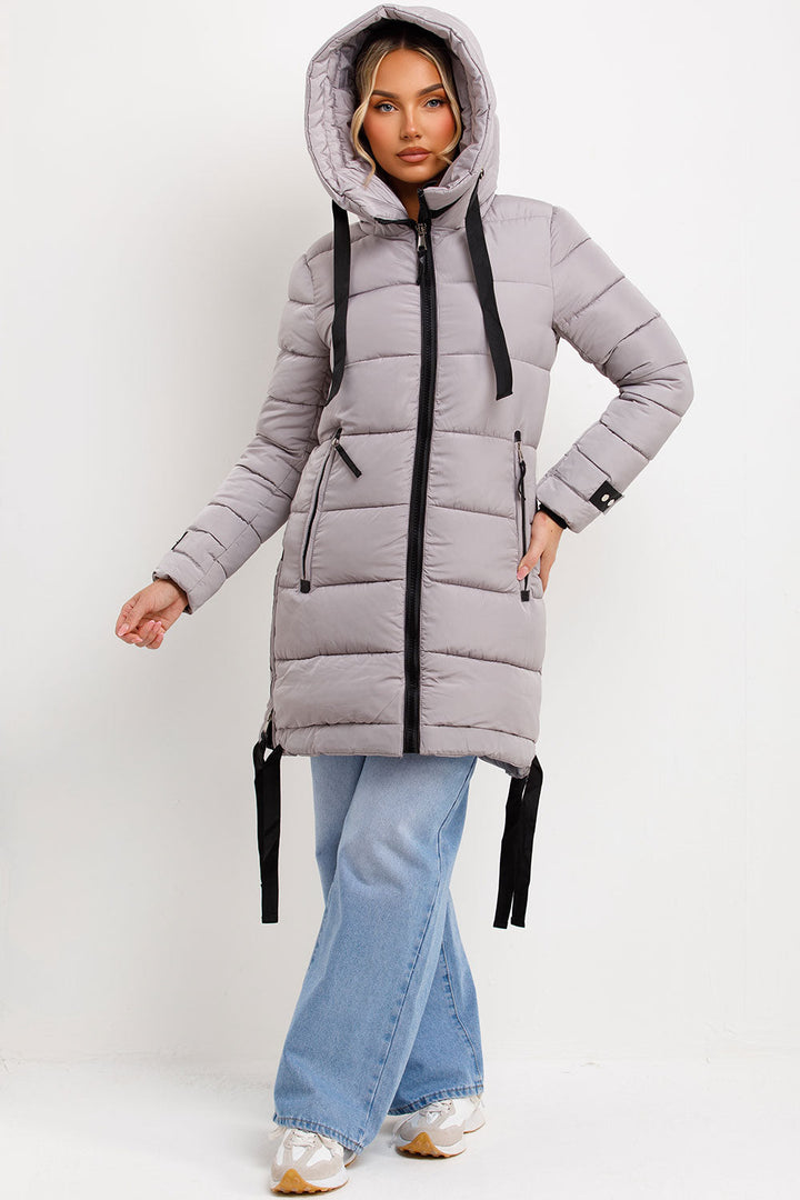 Ambriah | Women’s long puffer coat with hood and side straps